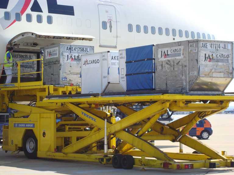 Baggage handler shows the complicated way luggage is loaded onto